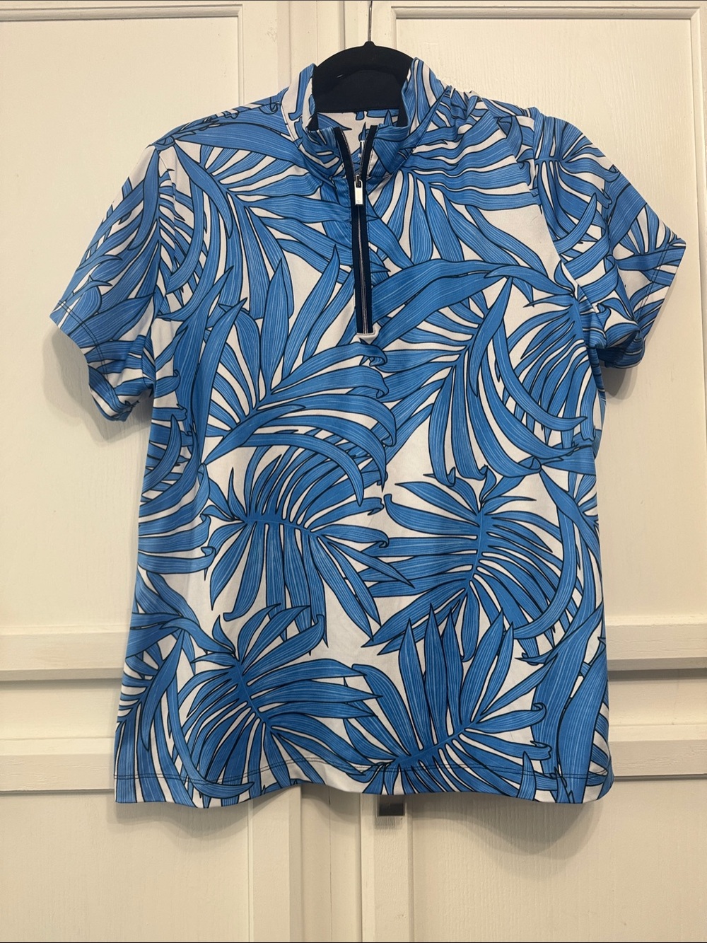 Woman’s Golf Blue Palm-Print Short-Sleeve Quarter-Zip Polo